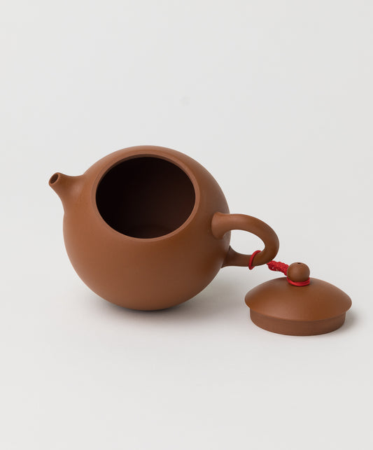 terracotta clay teapot open lid