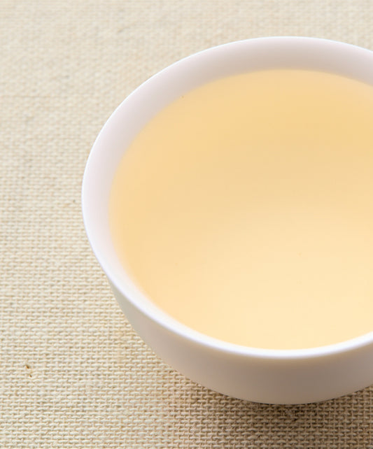 sanxia yellow tea liquid in a cup