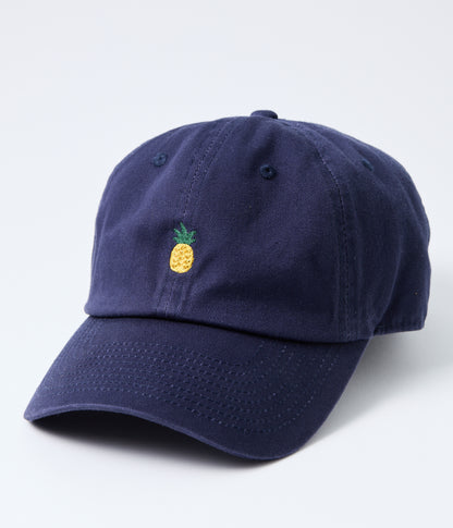 Navy blue cap with a pineapple emblem on a light gray background