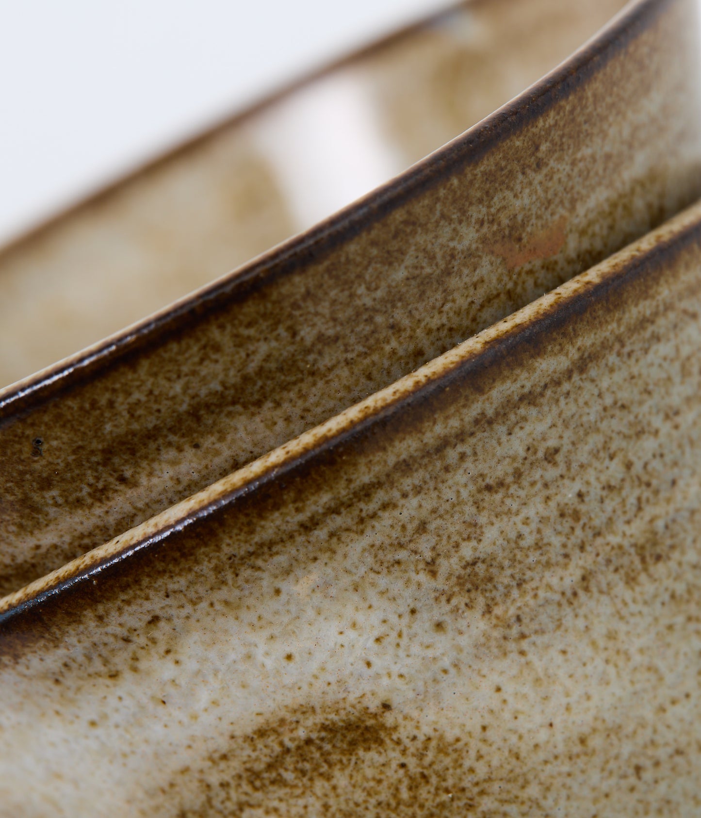 Close-up of a ceramic bowl with a textured surface