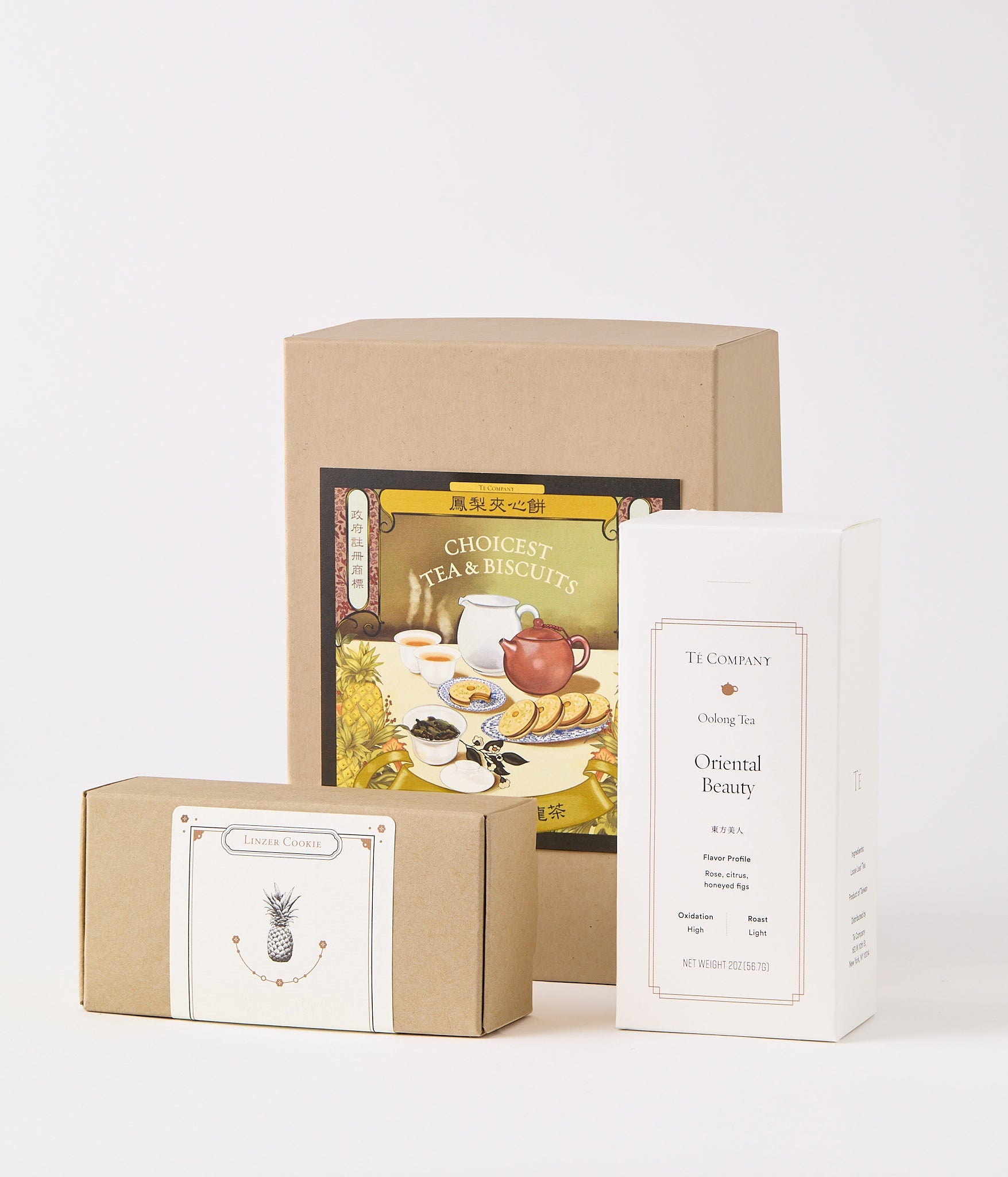 Tea packaging with a box and a white container on a light gray background