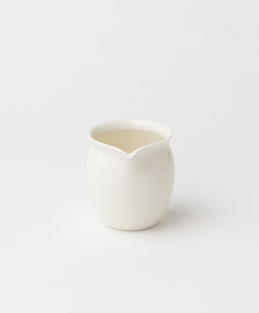 https://tecompanytea.com/cdn/shop/files/small-porcelain-pitcher-front_900x.jpg?v=1684963015