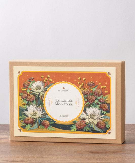 A box labeled Taiwanese Mooncake by Te Company with an floral illustration featuring flowers.