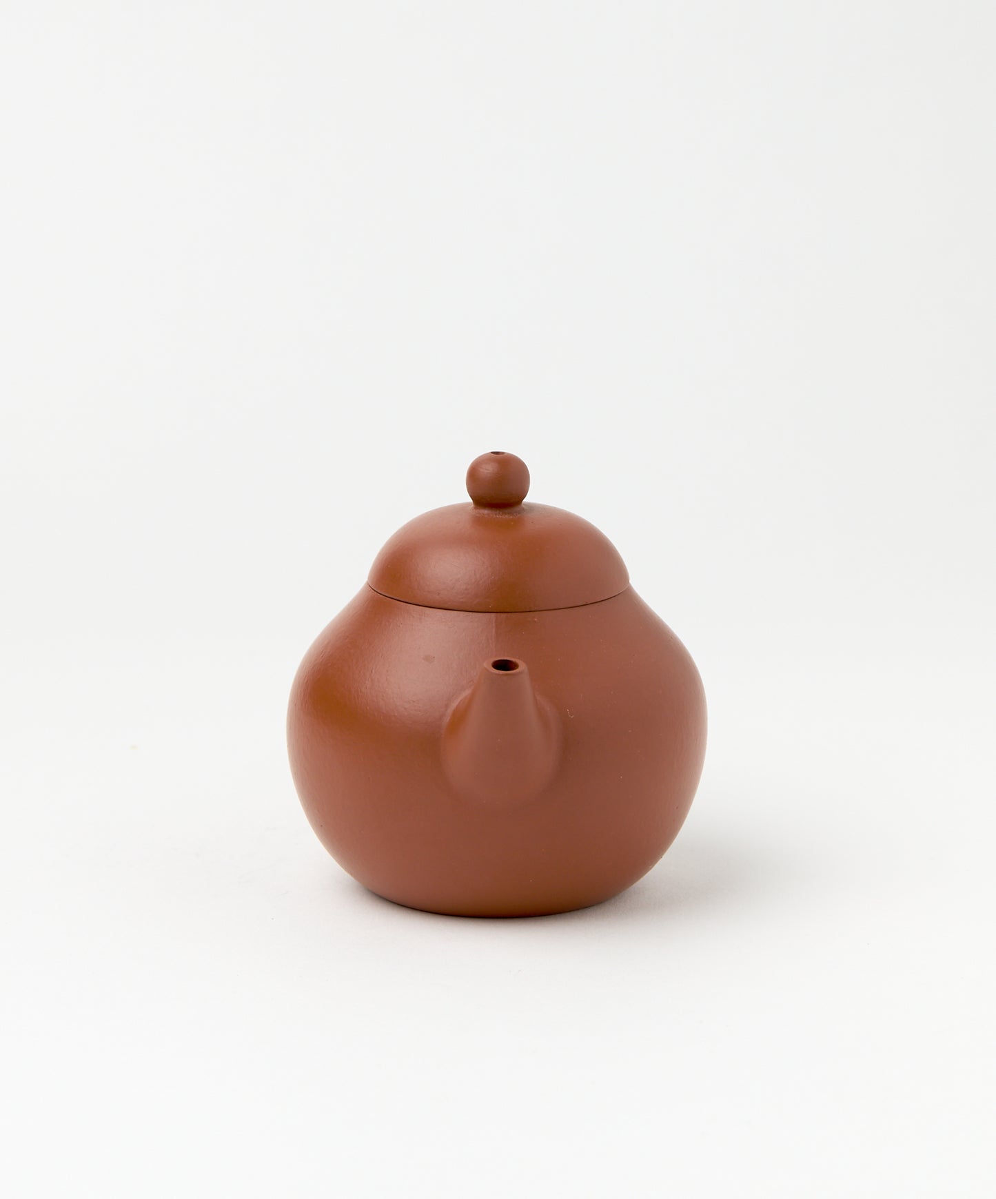 Front view of the Professor Yixing Clay teapot showcasing the spout and lid.