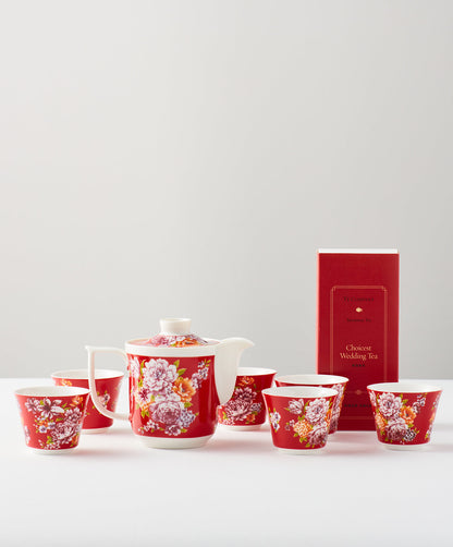 Red floral tea set with a teapot, six cups, and ‘Choicest Wedding Tea’ box.